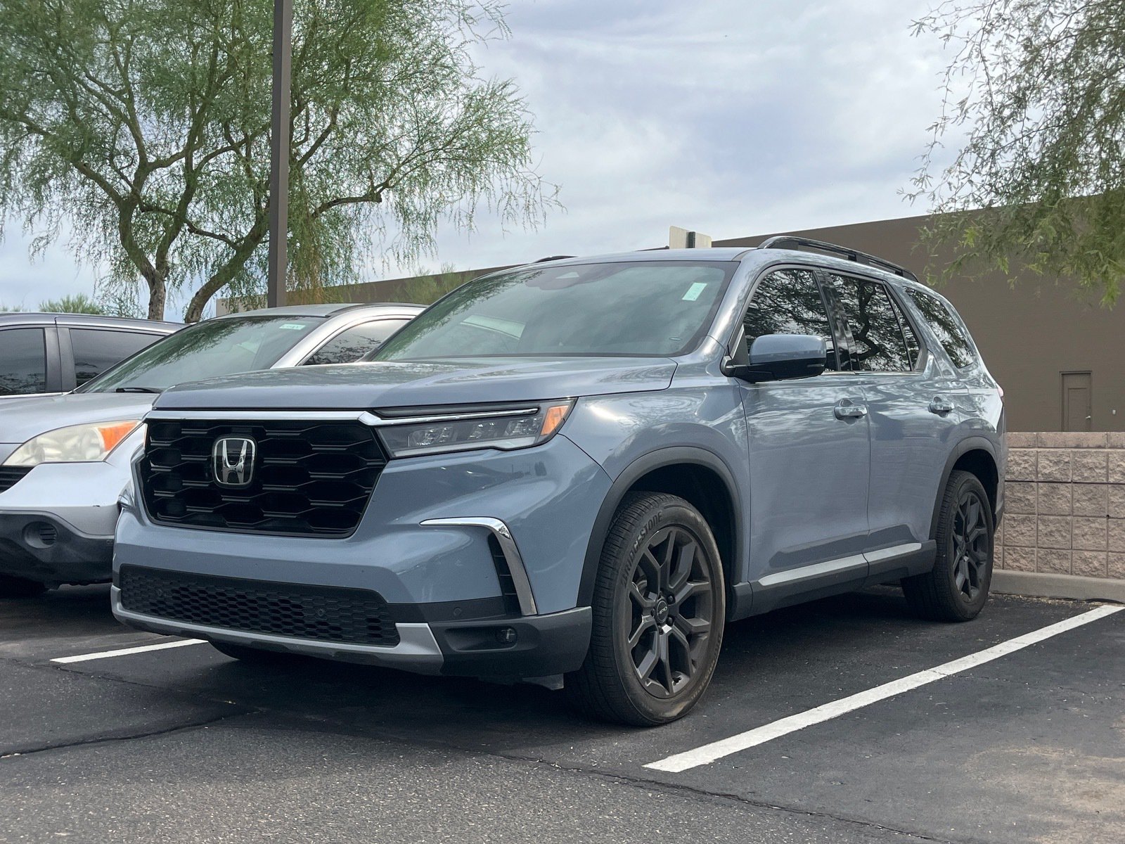 2025 Honda Pilot Touring — photo 1