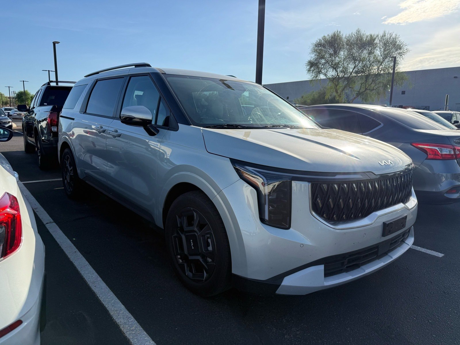 2026 Kia Carnival Hybrid EX — photo 4 thumbnail