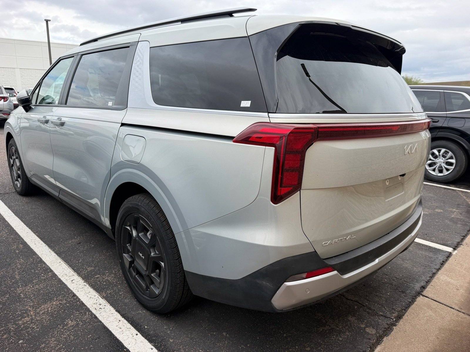 2026 Kia Carnival Hybrid EX — photo 2 thumbnail